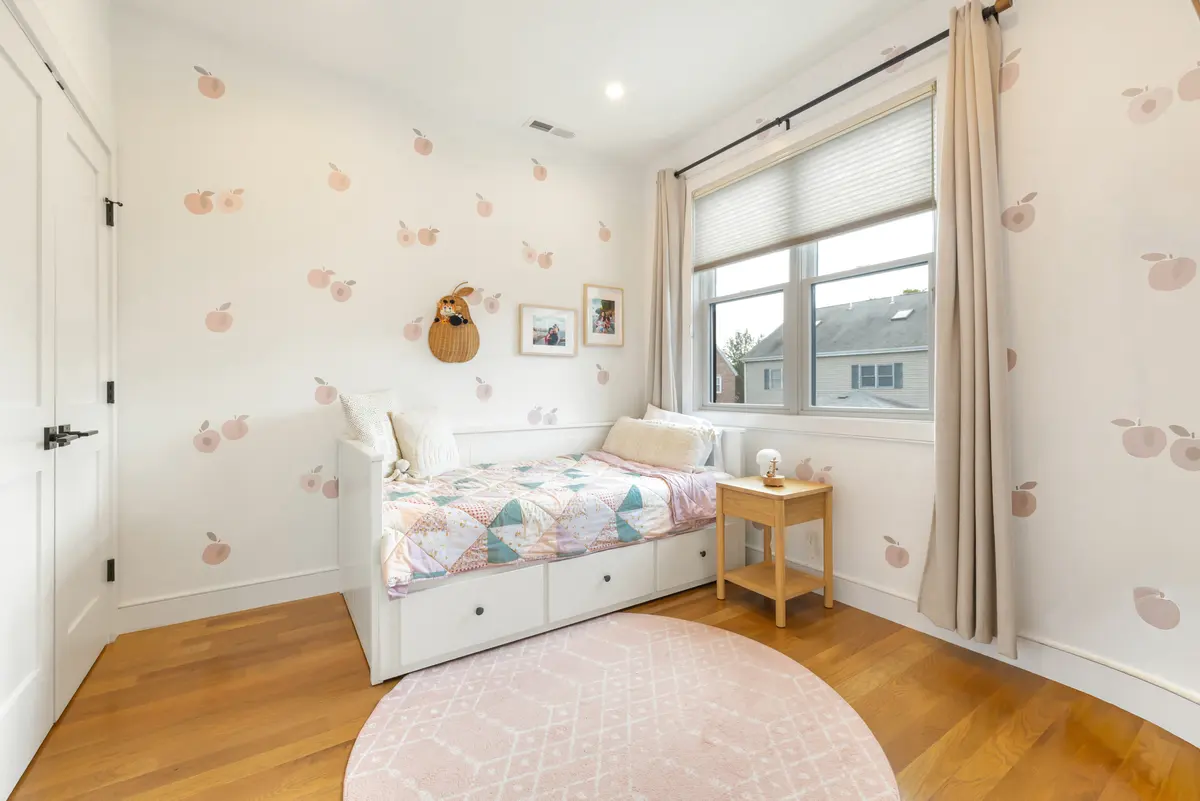 Second-floor bedroom with a window seat