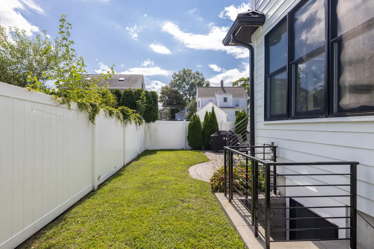 The fenced back lawn